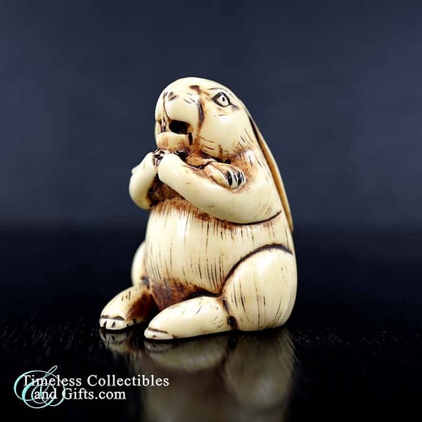 1990 Carved Rabbit Netsuke Holding A Carrot 1 copy